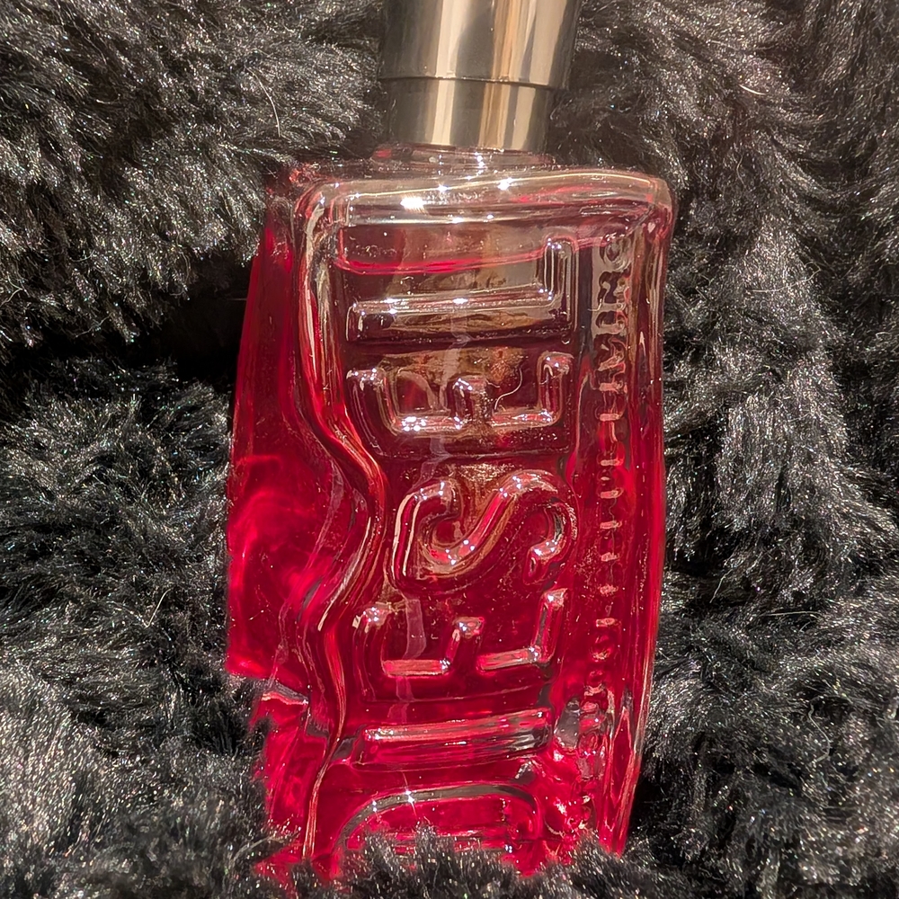 Diesel Red Embossed Glass Bottle